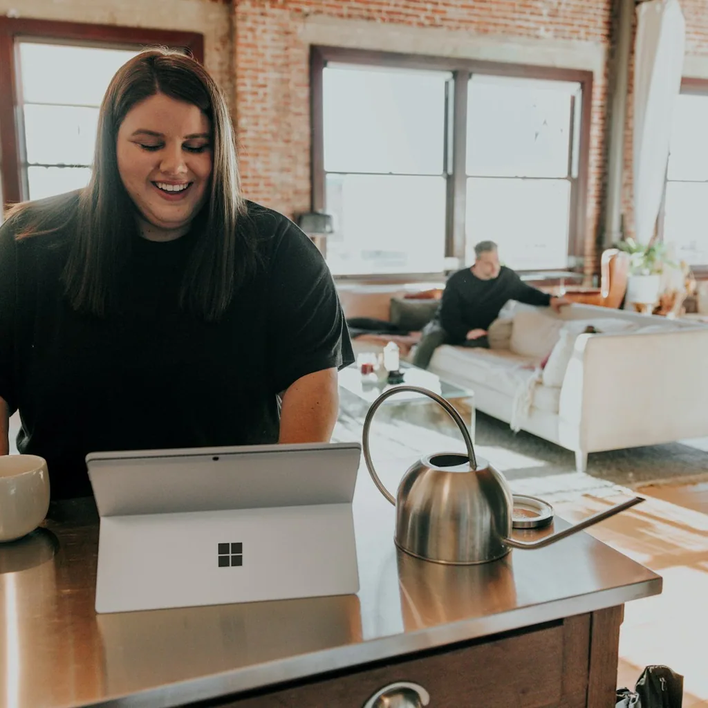 A business owner happily reviewing their new site